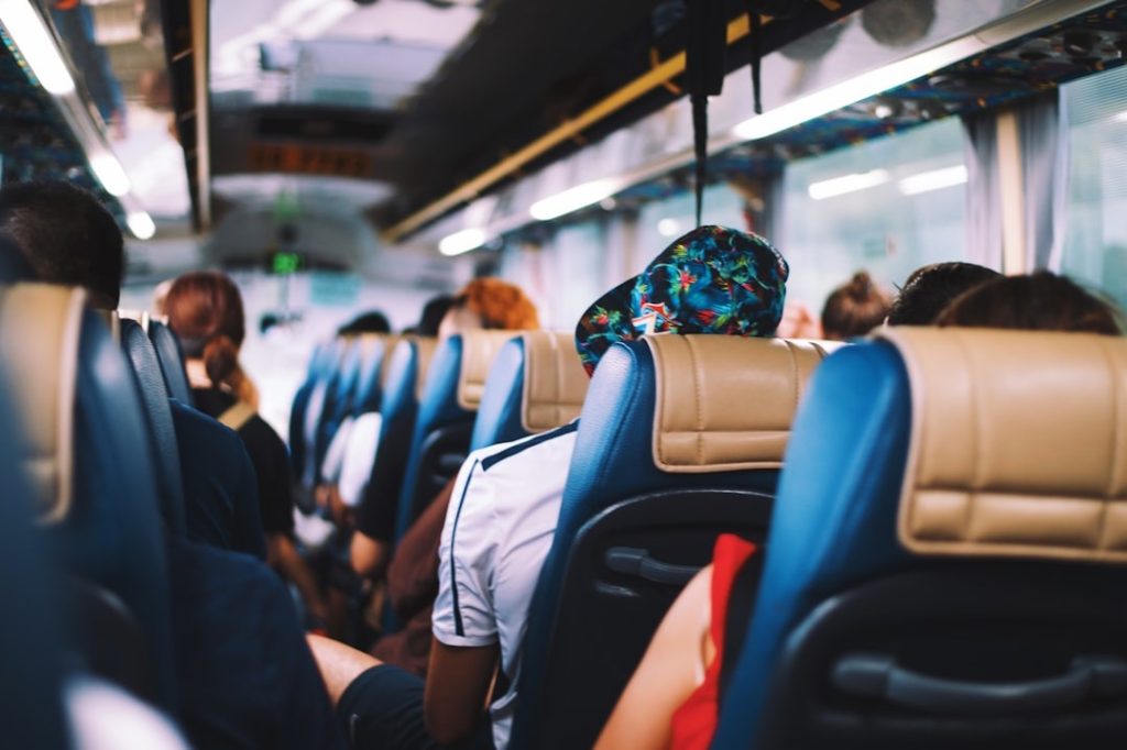 passengers sitting comfortably inside a bus to St. Anne’s Park